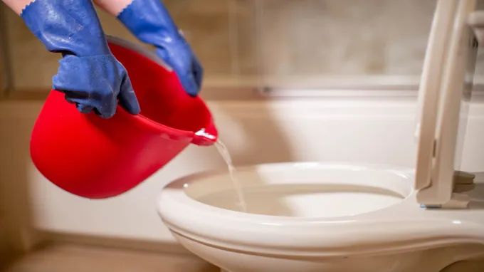 can a clogged toilet cause low water pressure