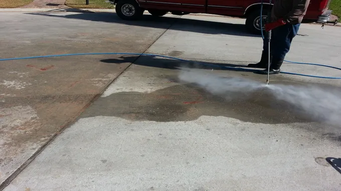 when can you pressure wash new concrete