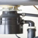 When I Turn on Garbage Disposal Water Comes Up: How to Fix It