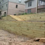 When Is a Retaining Wall Needed: Signs, Cost, and Best Materials