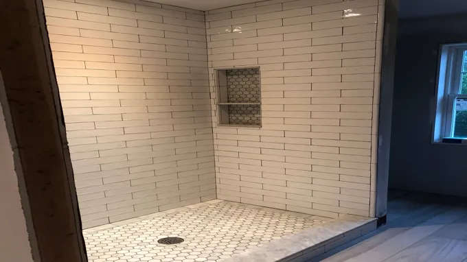 when tiling a shower where to start