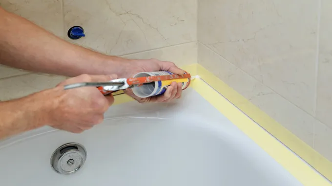 when to remove tape when caulking