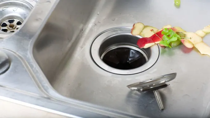 when were garbage disposals invented