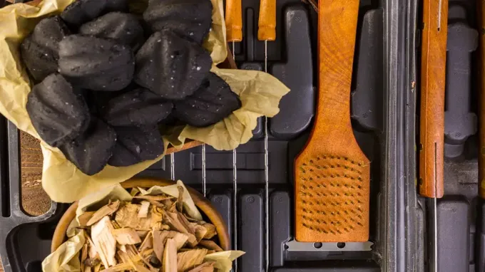 when to put wood chips on charcoal