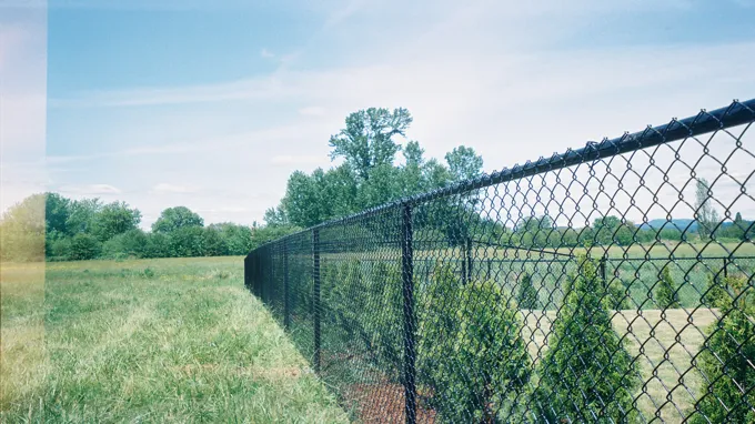 when was chain link fence invented